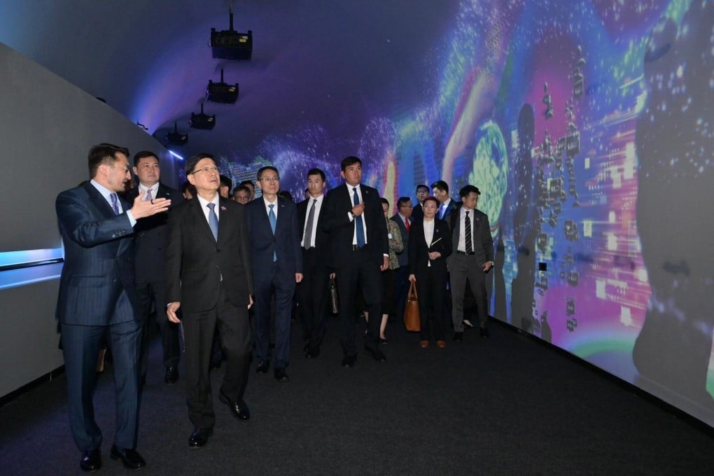 Hong Kong Chief Executive John Lee Ka-chiu visits the Astana Hub to learn about the latest Kazakh developments in artificial intelligence on June 1, in Kazakhstan. Photo: ISD