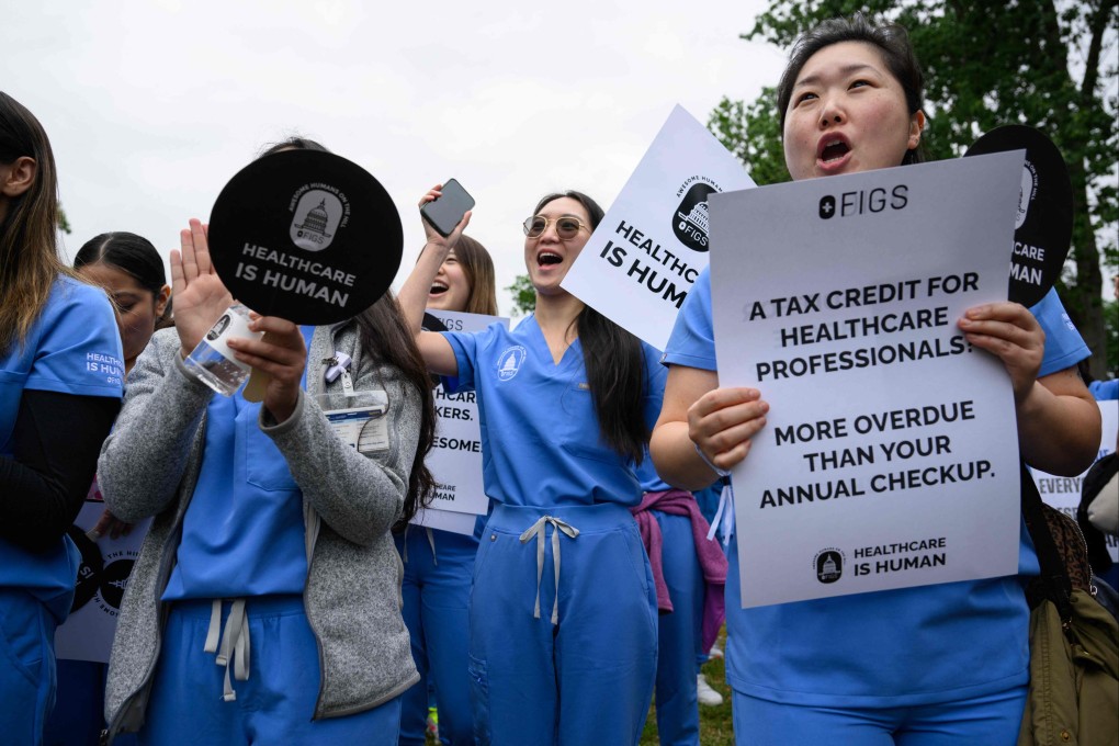 Nurses and healthcare workers cheer at a “Healthcare is Human” rally on Capitol Hill last month. The healthcare sector remained one of the US labour market’s strongest performers. Photo: AFP