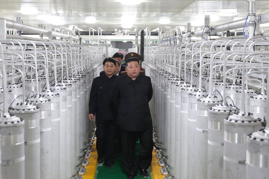 North Korean leader Kim Jong-un (centre, right) inspects a nuclear materials production factory at an undisclosed location on Wednesday. Photo: EPA/KCNA