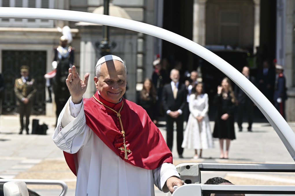 Pope Leo waves to faithful from the popemobile after a welcoming event at the Royal Palace in Madrid, Spain, on Saturday. Photo: EPA