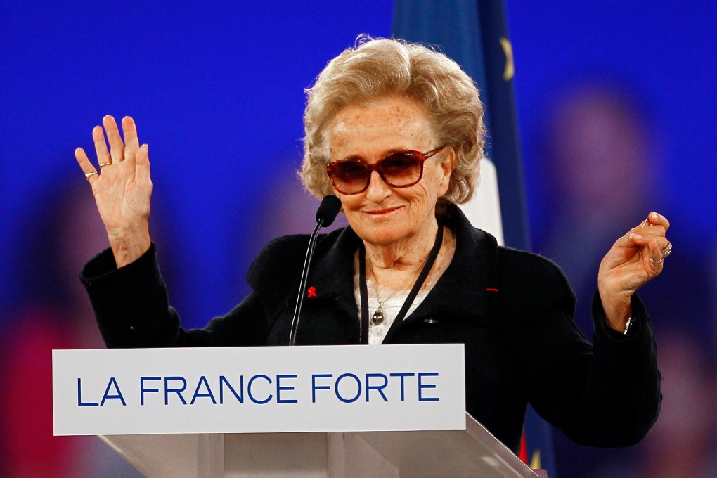 France’s former first lady Bernadette Chirac waves during a  campaign event in Villepinte, north of Paris, in March 2012. Photo: AP