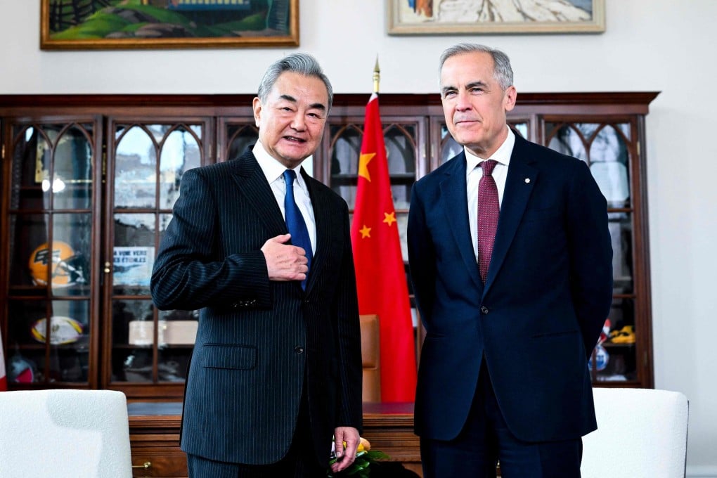 Canadian Prime Minister Mark Carney pictured with Chinese Foreign Minister Wang Yi in his office in Ottawa on May 29. Photo: AFP