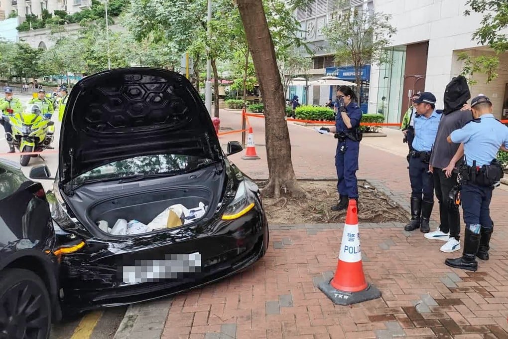 Police arrested the driver after his car slammed into a parked vehicle on Hoi Fai Road. Photo: Handout