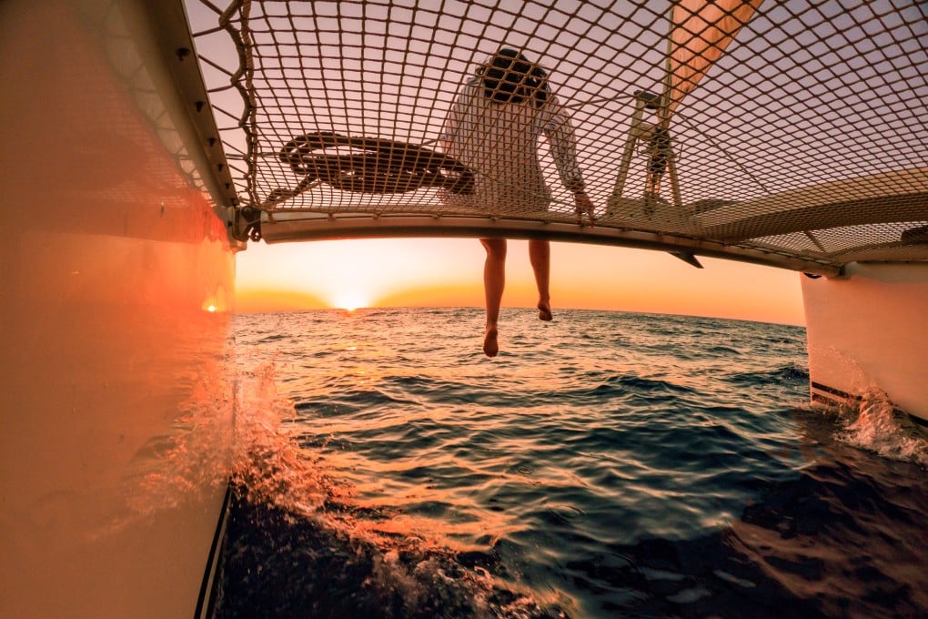 Sunset on the Mediterranean, just off the coast of Ibiza, Spain. Photo: Getty Images
