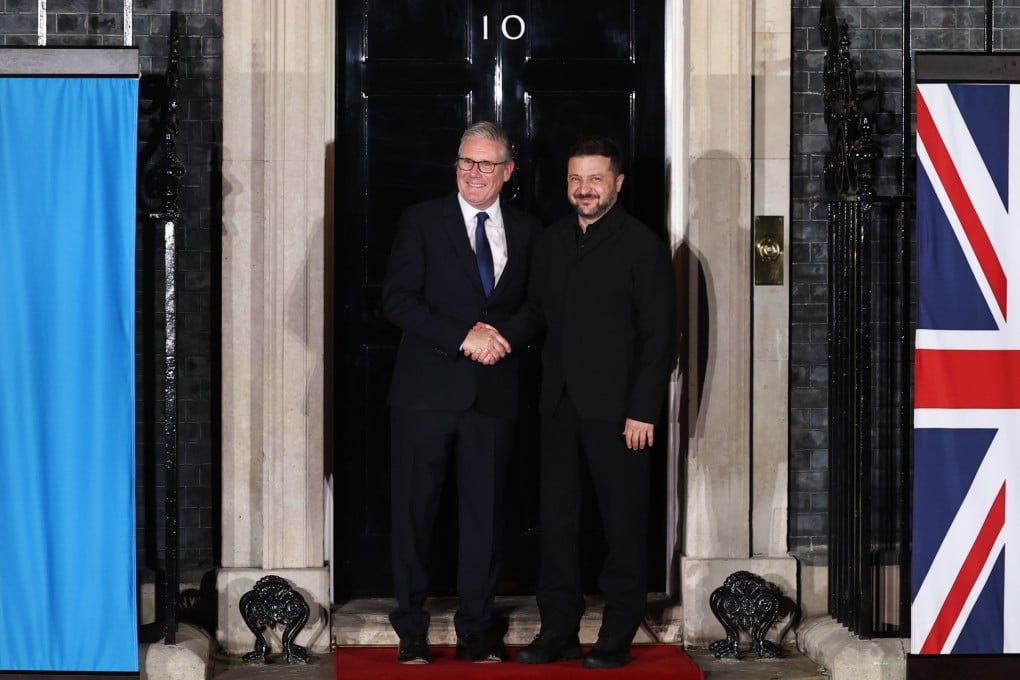 Britain’s Prime Minister Keir Starmer, left, says goodbye to Ukrainian President Volodymyr Zelensky after a meeting at 10 Downing Street in London, UK on Sunday. Photo: EPA
