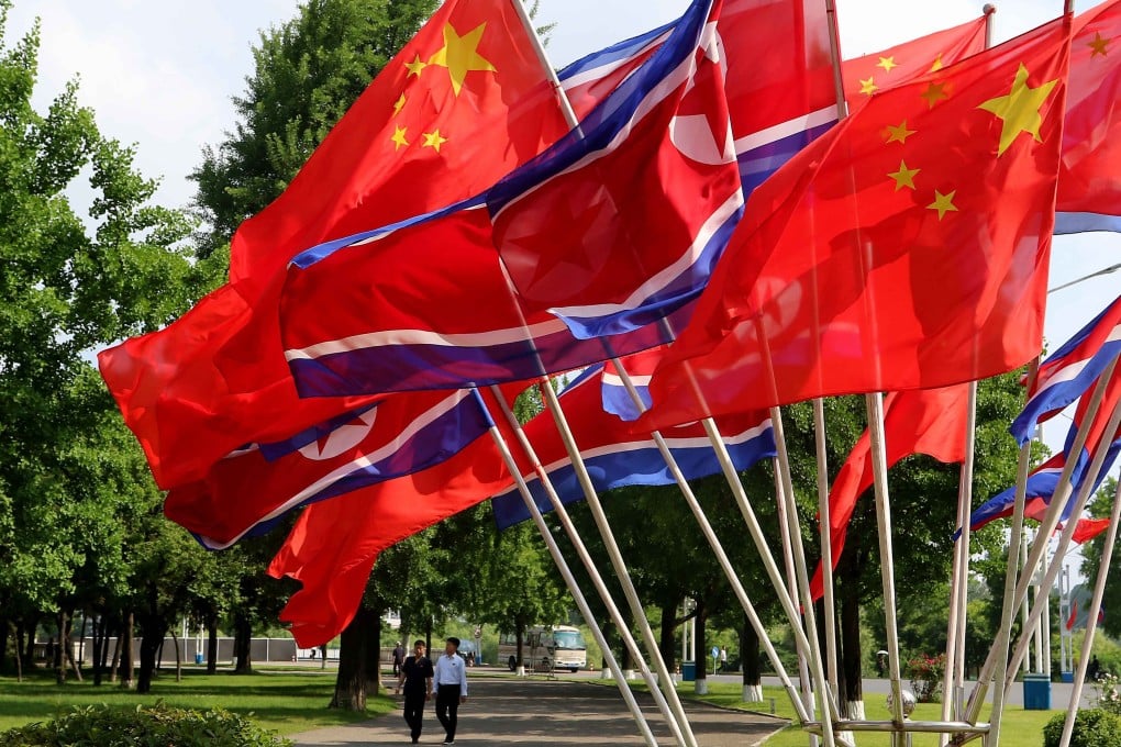 A street in Pyongyang decorated with the flags of China and North Korea on Monday. Photo: AP