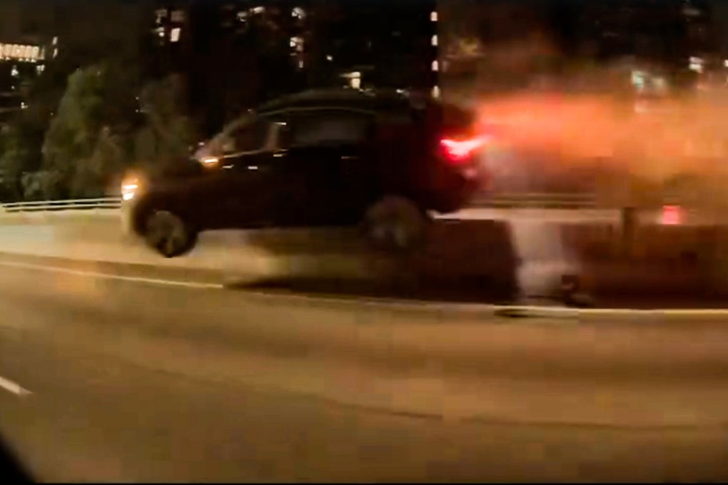 An Audi SUV flew across the central divider on Tuen Mun Road and hit a vehicle travelling on the opposite carriageway  Photo: Handout