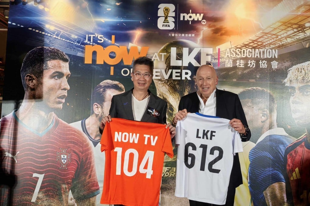 Bruce Lam (left) and Allan Zeman holding up shirts showing the number of World Cup matches Now TV will broadcast (104) and the day they begin, June 12. Photo: Ada Li