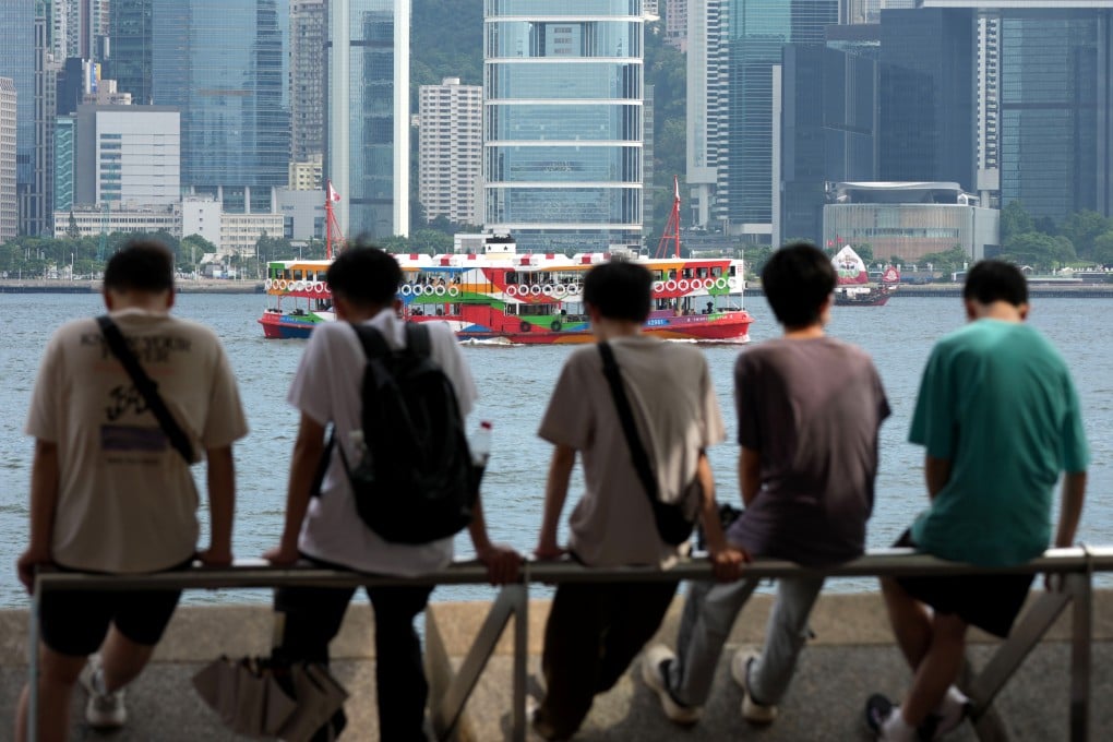 Young people sit along the Tsim Sha Tsui waterfront on June 5. Photo: Jelly Tse