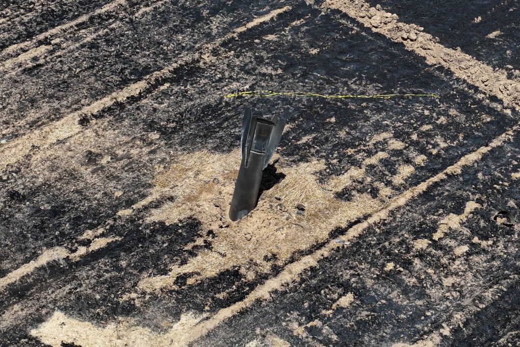 The remains of an Israel-bound Iranian ballistic missile that landed in an agricultural field in the Damascus countryside, Syria, following Monday's exchange of fire. Photo: EPA