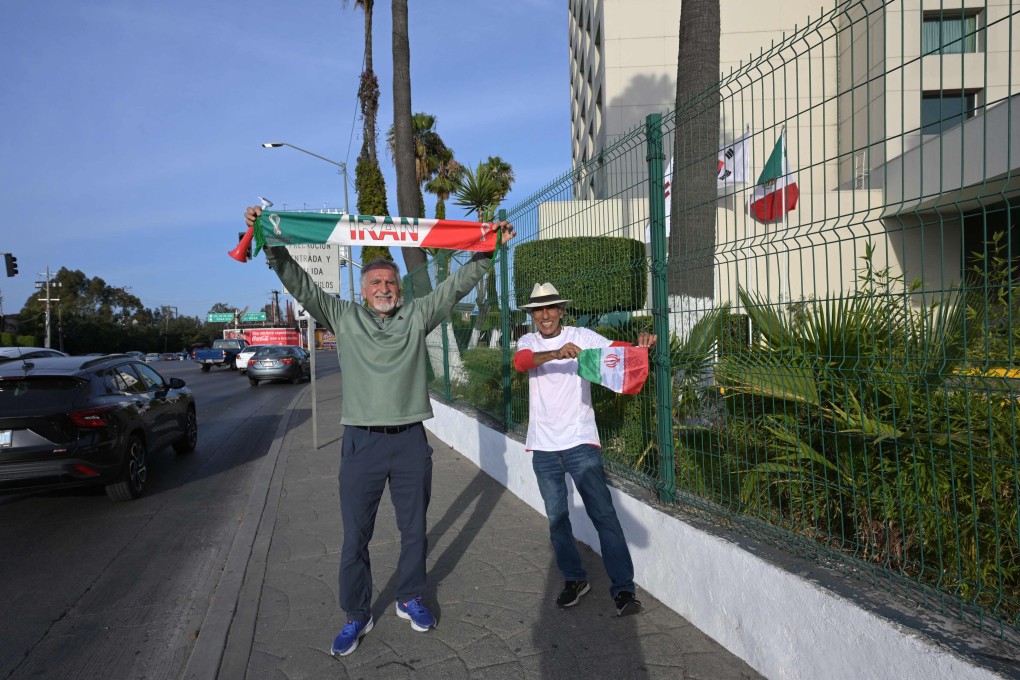 Iranian supporters staying at the same hotel as Iran’s national football team cheer for their team in Tijuana, Mexico, on Monday ahead of the World Cup. Photo: AFP