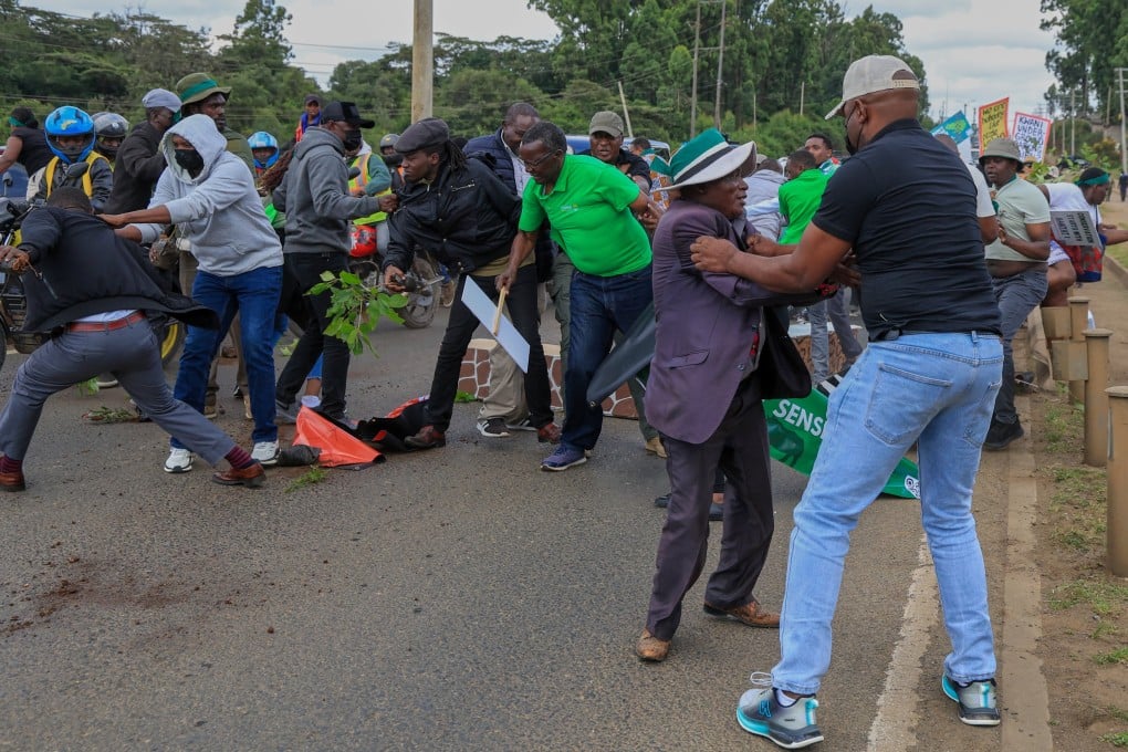 Plainclothes police officers arrest protesters during a demonstration against plans they say would affect wildlife habitat in Nairobi National Park in Nairobi, Kenya on Monday. Photo: AP