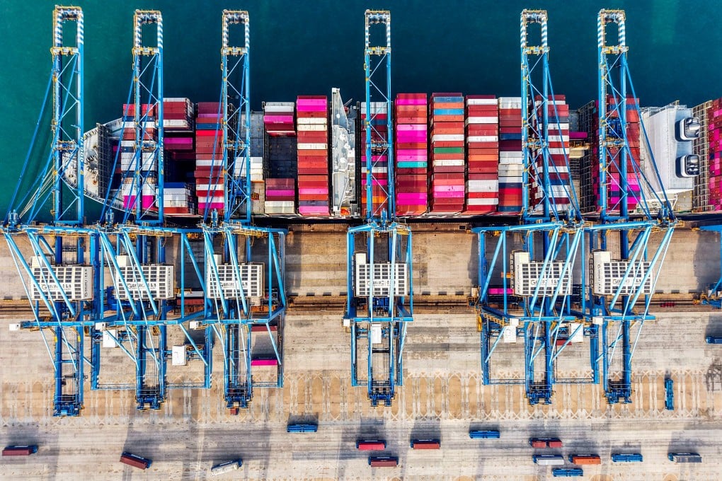 Containers are unloaded at a port in China’s eastern Shandong province. Photo: Getty Images
