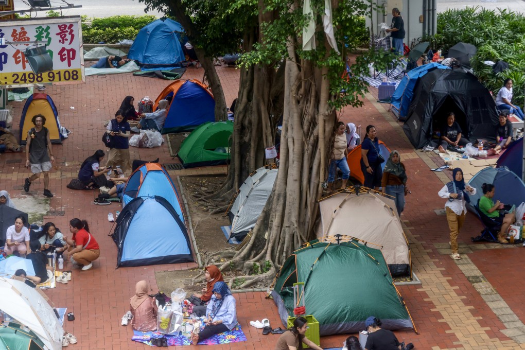 Domestic workers gather around tents in Tsuen Wan on their day off on May 24. Photo: Jonathan Wong