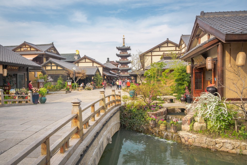 Tourists stroll around a historical district in Wuxi. The city on the shores of Lake Taihu in China’s Jiangsu province is known for its canals, temples, peaceful gardens and decadent cuisine that reflects its wealthy industrial past. Photo: Shutterstock