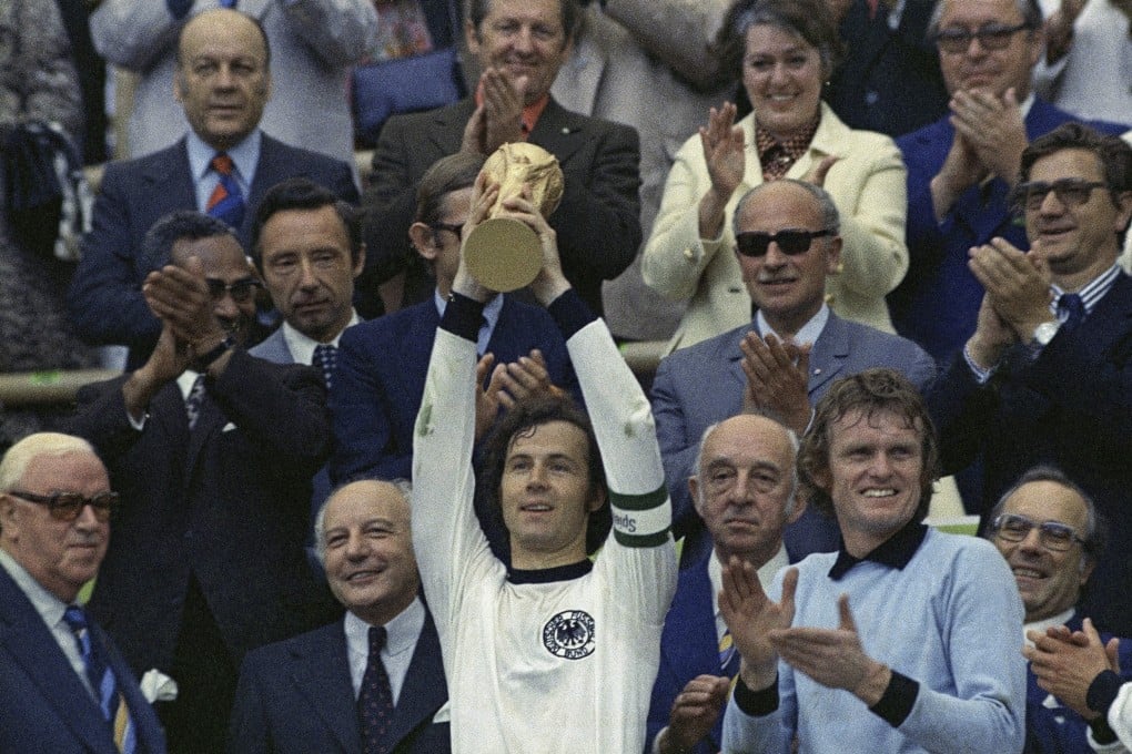 West Germany captain Franz Beckenbauer holds up the iconic World Cup trophy after his team defeated the Netherlands by 2-1 in the World Cup soccer final at Munich’s Olympic Stadium, in West Germany, on July 7, 1974. Photo: AP