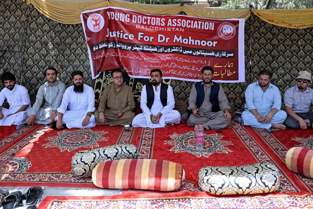 Medical practitioners stage a protest to express solidarity with acid attack victim Mahnoor Nasir in Quetta on Tuesday. Photo: AFP