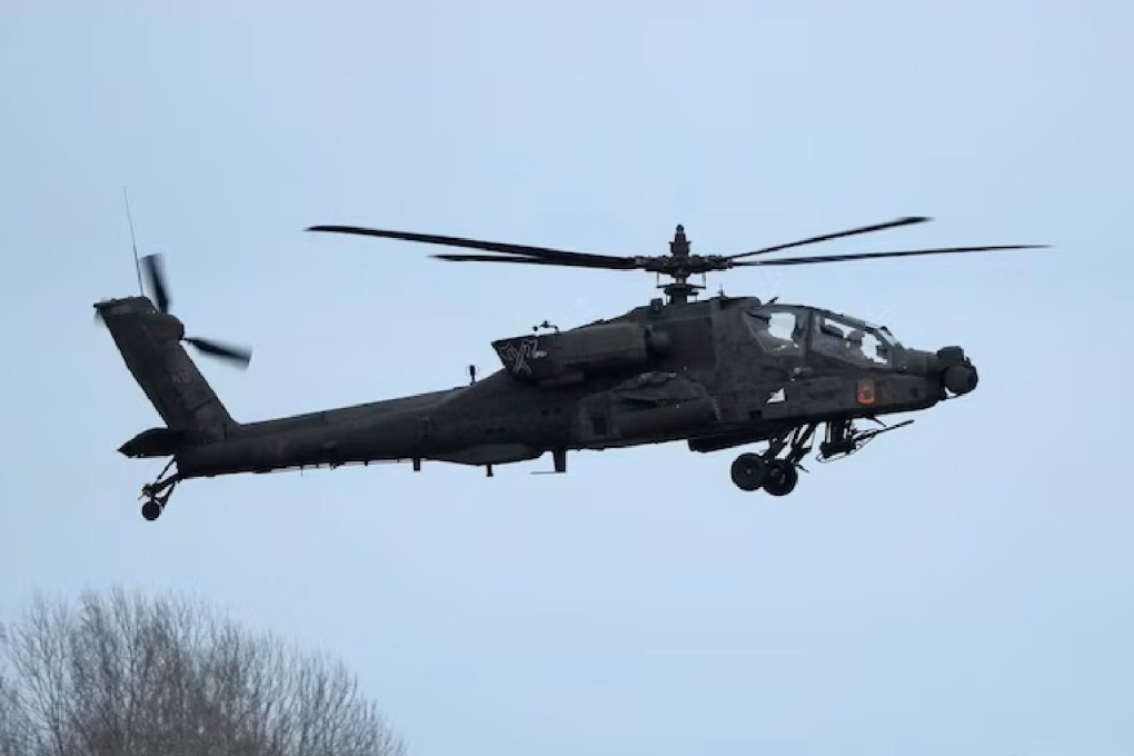 US forces rescued two crew members near Oman after their Apache helicopter went down during a patrol. President Donald Trump vowed to retaliate against the downing of the US military aircraft. Photo: Reuters