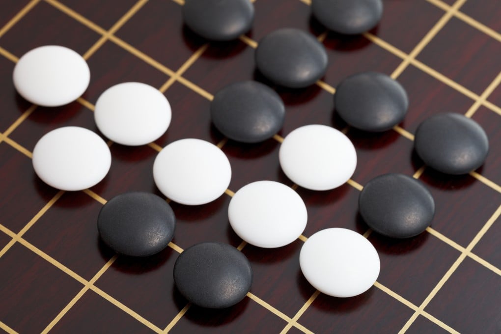 Weiqi, better known in the West by its Japanese name, go, is played by two opponents using black and white stones on a board marked with a 19-by-19 grid, creating 361 intersections. Its history dates back more than two millennia. Photo: vvoe/Shutterstock