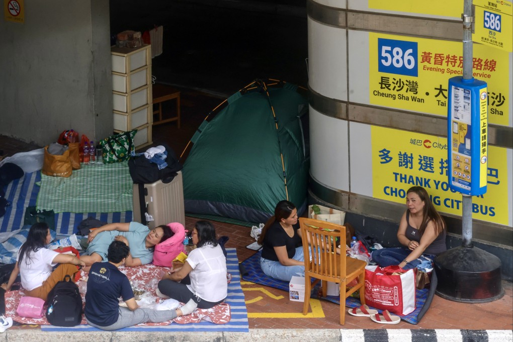 Domestic helpers rest in makeshift shelters in Tsuen Wan on May 24. Photo: Jonathan Wong