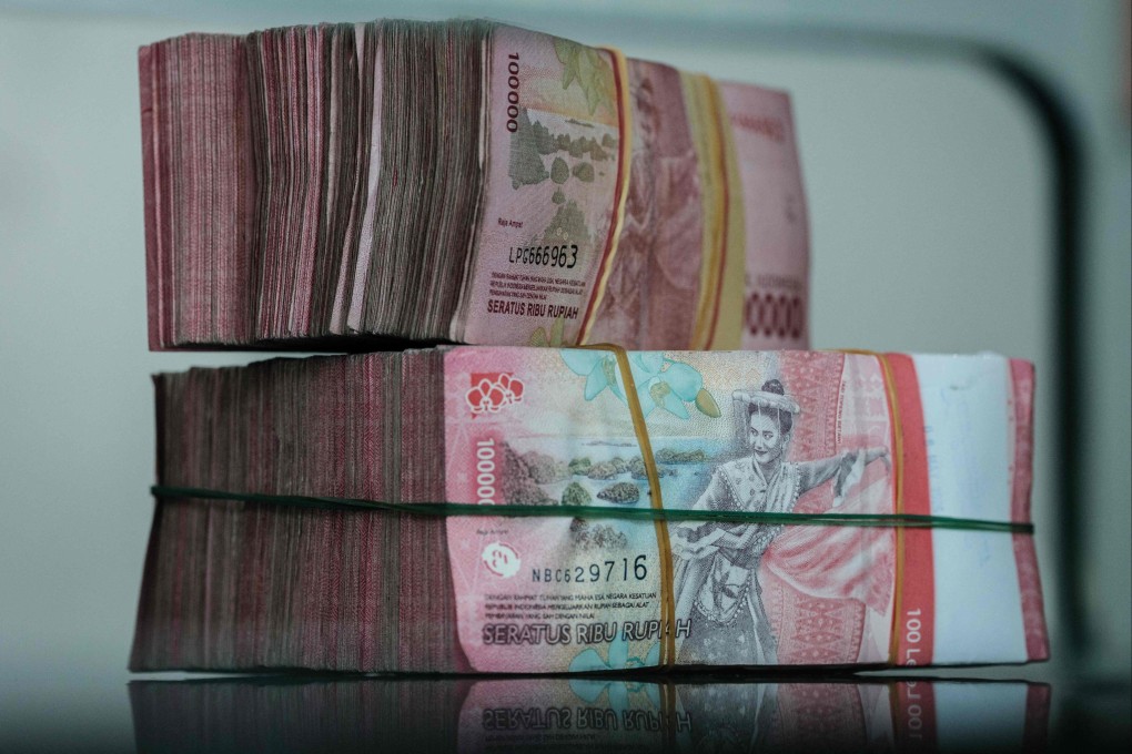 Bundles of Indonesian rupiah are pictured at a currency exchange office in Jakarta on June 4, 2026. Photo: AFP