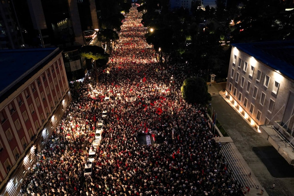 People protest against a resort project linked to Jared Kushner in Tirana, Albania, on Wednesday. Photo: Reuters