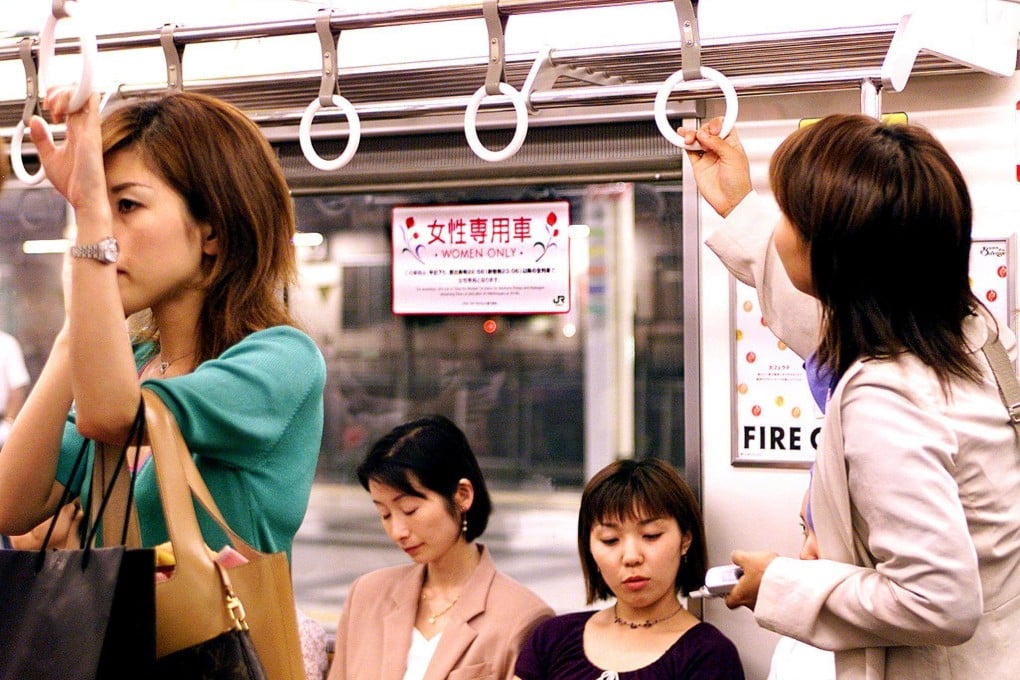 Female passengers wait to leave Tokyo’s Shinjuku station in a women-only carriage late at night in July 2001. Photo: AFP