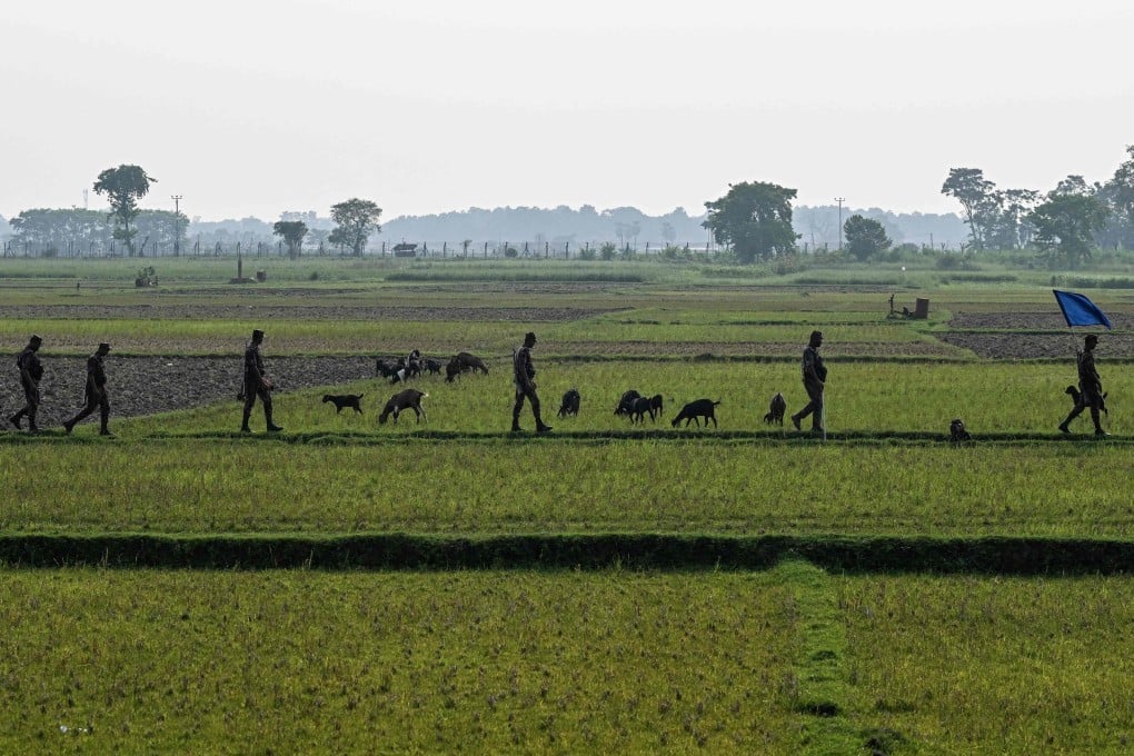 Border Guard Bangladesh personnel patrol near the Benapole-Petrapole frontier crossing between Bangladesh and India in Benapole on June 3. Photo: AFP