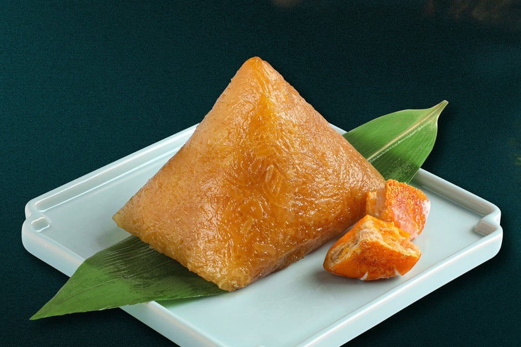 A golden kumquat rice dumpling from Tsui Hang Village in Hong Kong. Alkaline rice dumplings are a Dragon Boat Festival sweet treat with ancient origins. Photo: Tsui Hang Village