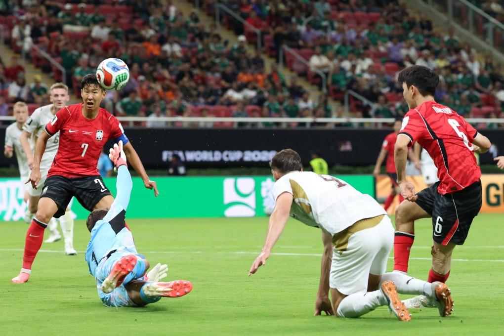 Hwang In-beom (right) dinks in a clever equaliser for South Korea in the 67th minute  against the Czech Republic. Photo: EPA