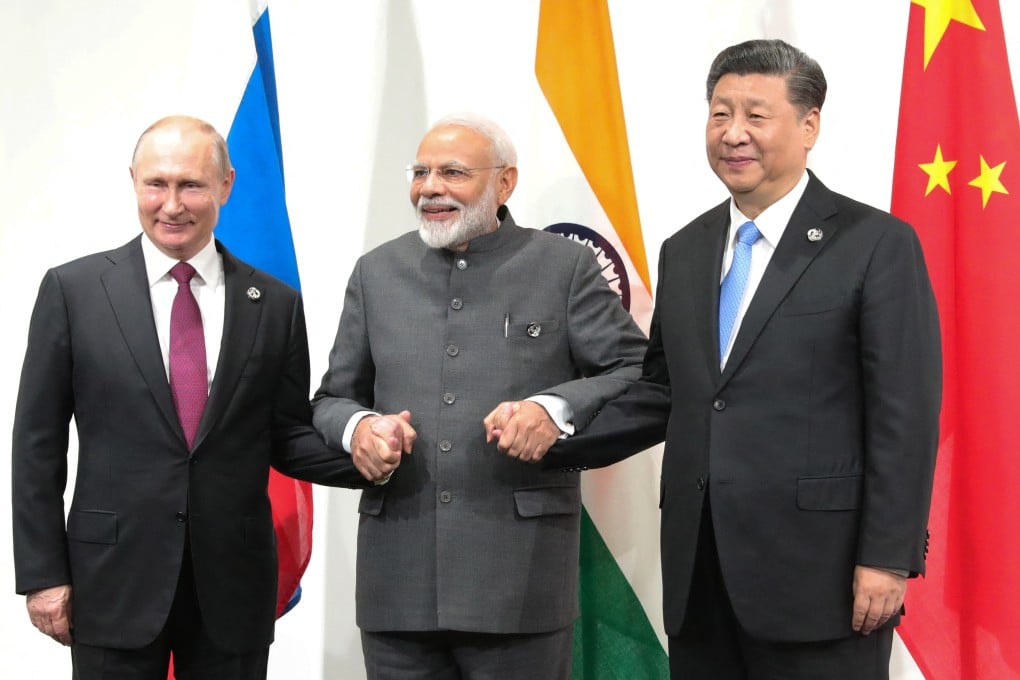 (From left to right) Russian President Vladimir Putin, Indian Prime Minister Narendra Modi and Chinese President Xi Jinping hold a meeting on the sidelines of the G20 summit in Osaka, Japan, on June 28, 2019. Photo: SPUTNIK / AFP