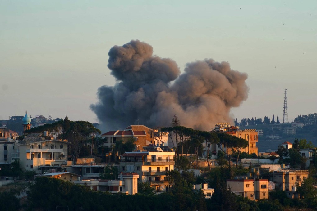 Smoke rises from the site of an Israeli airstrike that targeted the southern Lebanese city of Nabatieh on Friday. Iran is demanding Israel end a campaign against Hezbollah in Lebanon as part of concluding its war. Photo: AFP