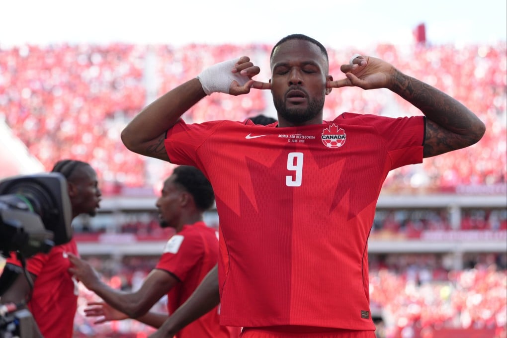 Canada’s Cyle Larin takes a moment and shuts out the noise after scoring his side’s equaliser. Photo: AP