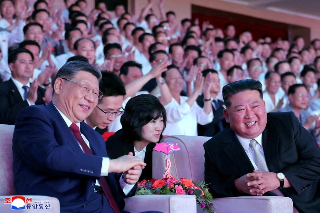Kim Jong-un and Xi Jinping watch a performance in Pyongyang during the Chinese leader’s visit. Photo: Reuters