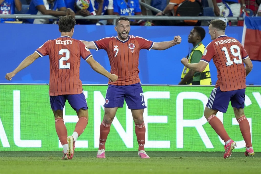 Scotland’s John McGinn (centre) celebrates scoring during the group C match against Haiti in the World Cup. Photo: Xinhua
