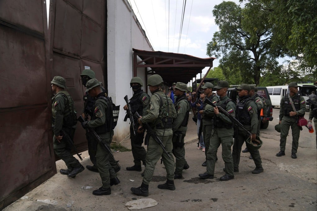 Soldiers raid the Tocoron Penitentiary Centre, where the Tren de Aragua gang originated, in Venezuela in September 2023. Photo: AP