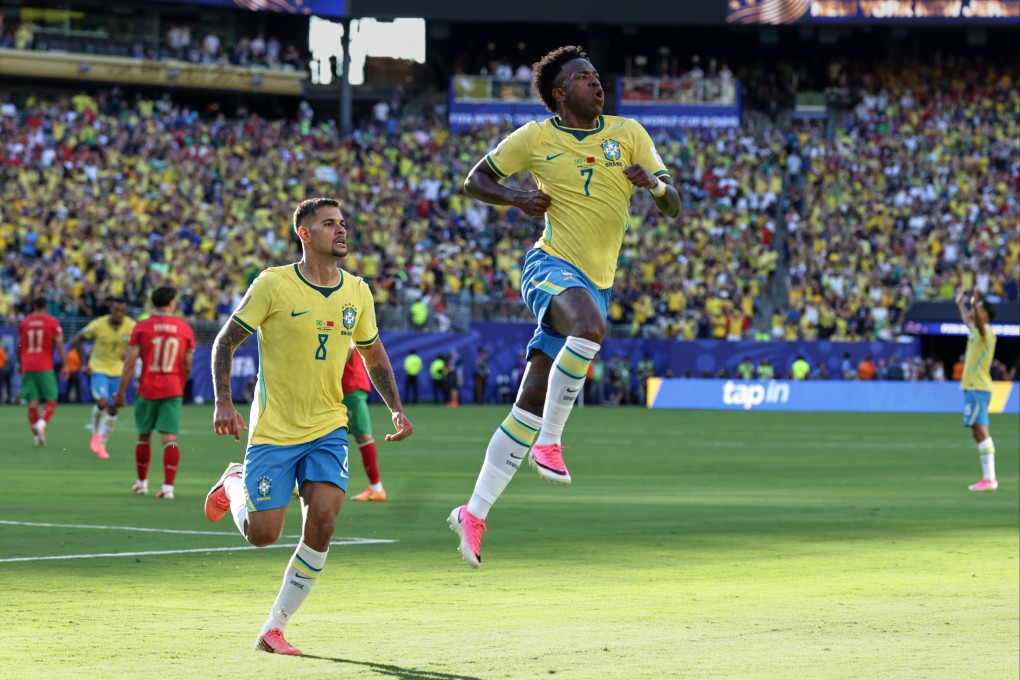 Brazil’s Vinicius Junior (right) celebrates with teammate Bruno Guimaraes after scoring their equaliser against Morocco on Sunday. Photo: AP