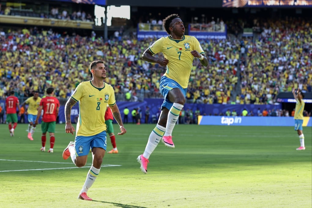 Brazil’s Vinicius Junior (right) celebrates with teammate Bruno Guimaraes after scoring their equaliser against Morocco on Sunday. Photo: AP