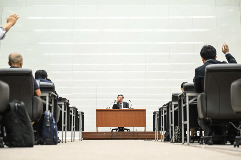 Bank of Japan governor Kazuo Ueda attends a press conference in Tokyo. The central bank kept its ultra-low interest rates unchanged on June 14, pushing the yen to a fresh 34-year low against the US dollar. Photo: AFP