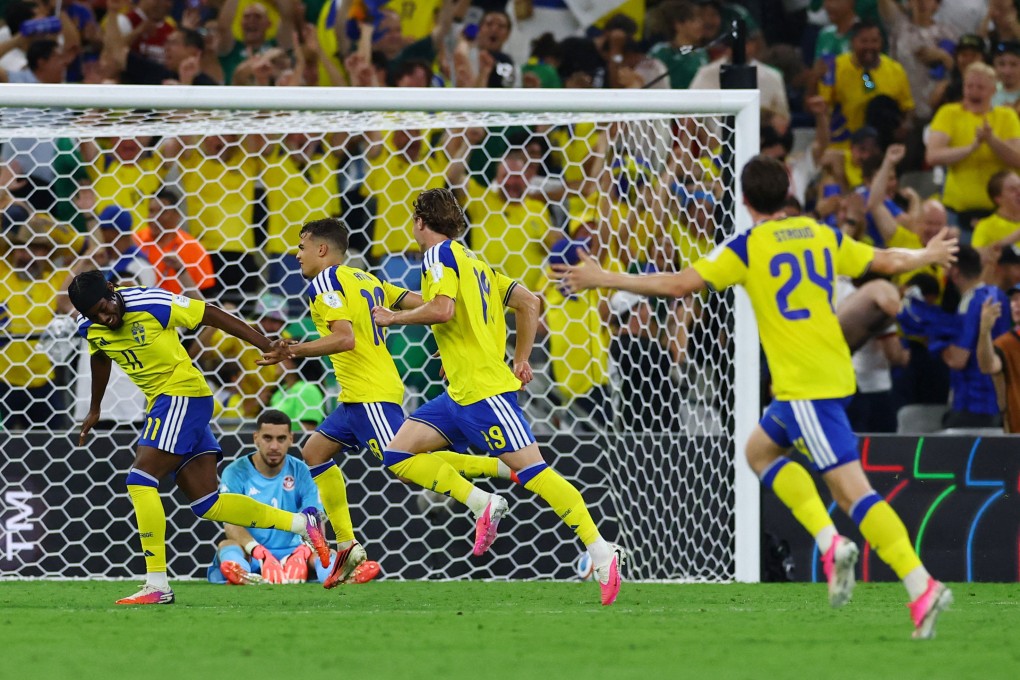 Sweden’s Yasin Ayari (second left) embarks on a celebratory run after his second goal. Photo: Reuters