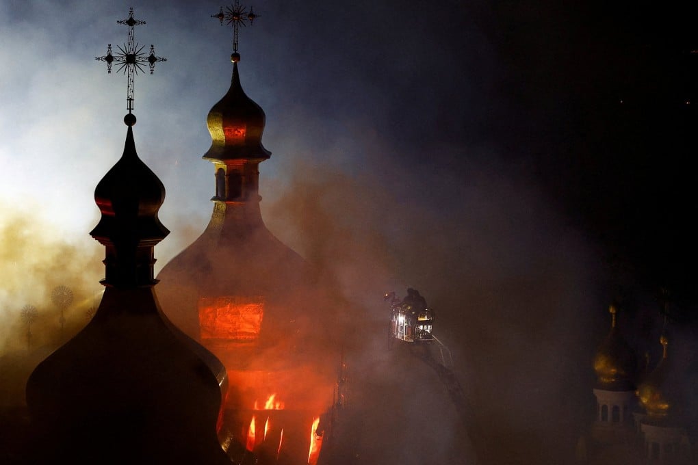 Smoke and fire rise from the Dormition Cathedral in the Orthodox complex of Kyiv-Pechersk Lavra following a Russian missile strike on Monday. Photo: Reuters