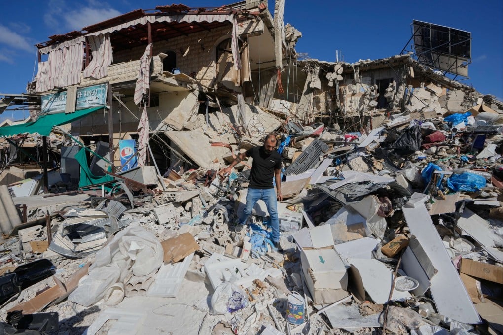 A man inspects his destroyed house after returning to Tibnin village, south Lebanon, on Monday following the announcement of an initial ceasefire agreement between the United States and Iran. Photo: AP