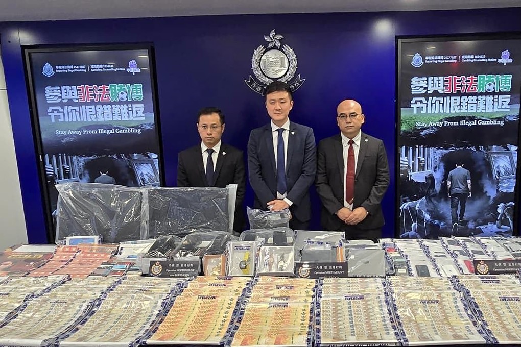 Police officers seized HK$1 million in cash, HK$4 million in assets and large quantities of computers and mobile phones during the raids. Photo: Handout