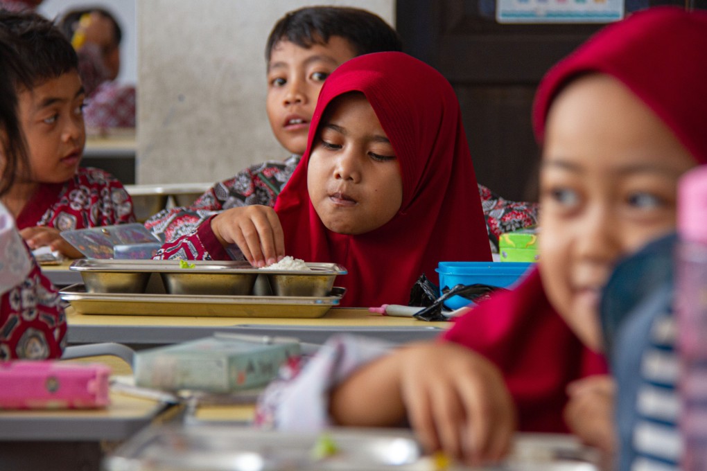 Students eat lunch provided by the Free Nutritious Meals programme in Bandung, West Java, on Friday. Photo: Xinhua