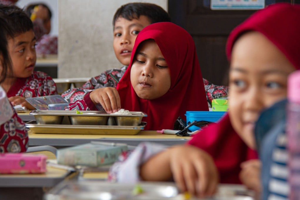 Students eat lunch provided by the Free Nutritious Meals programme in Bandung, West Java, on Friday. Photo: Xinhua