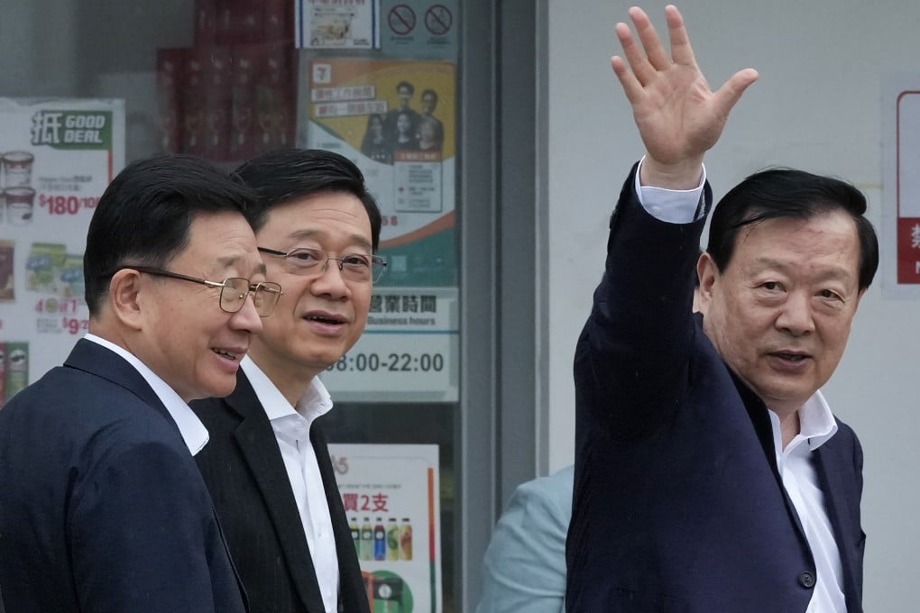 Xia Baolong (right), director of the Hong Kong and Macau Affairs Office, visits the Yau Pok Light Public Housing block in Yuen Long with Chief Executive John Lee (centre) on June 16. Xia is on a two-day visit to the city to review its alignment with the 15th national five-year plan and progress on the Northern Metropolis housing and economic hub. Photo: Jelly Tse