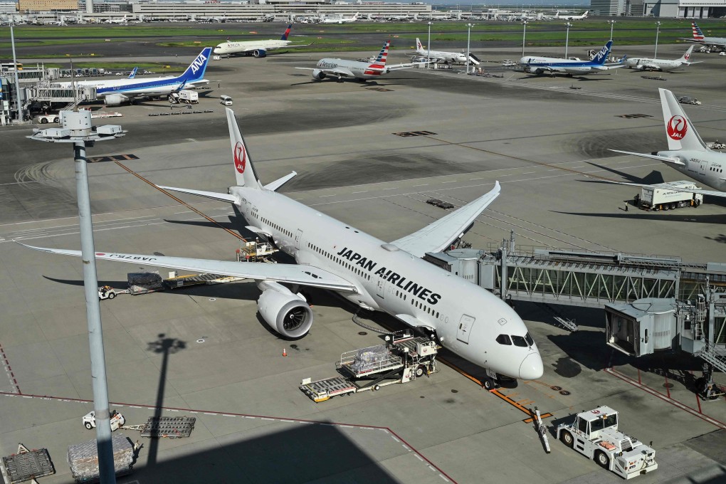 Japan Airlines and All Nippon Airways passenger jets at Tokyo International Airport in Haneda. Photo: AFP