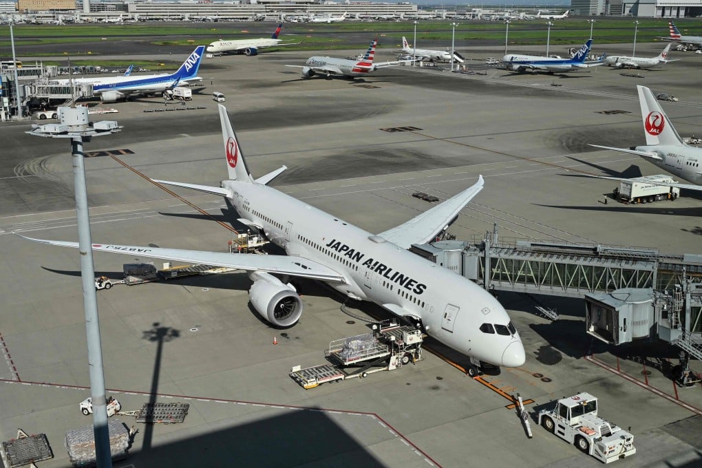 Japan Airlines and All Nippon Airways passenger jets at Tokyo International Airport in Haneda. Photo: AFP