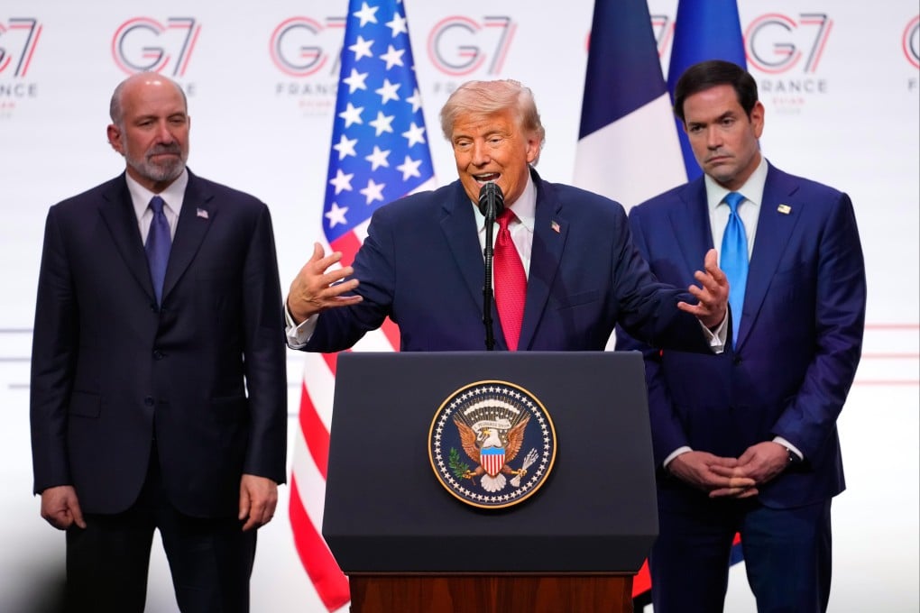 US President Donald Trump, flanked by US Secretary of Commerce Howard Lutnick and Secretary of State Marco Rubio during a media conference at the end of the G7 summit. Photo: AP