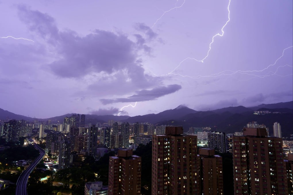 Lightning illuminates the night sky above Sha Tin on June 8. The Hong Kong Observatory issued the first black rainstorm warning of the year for an hour on June 8. Photo: Sam Tsang